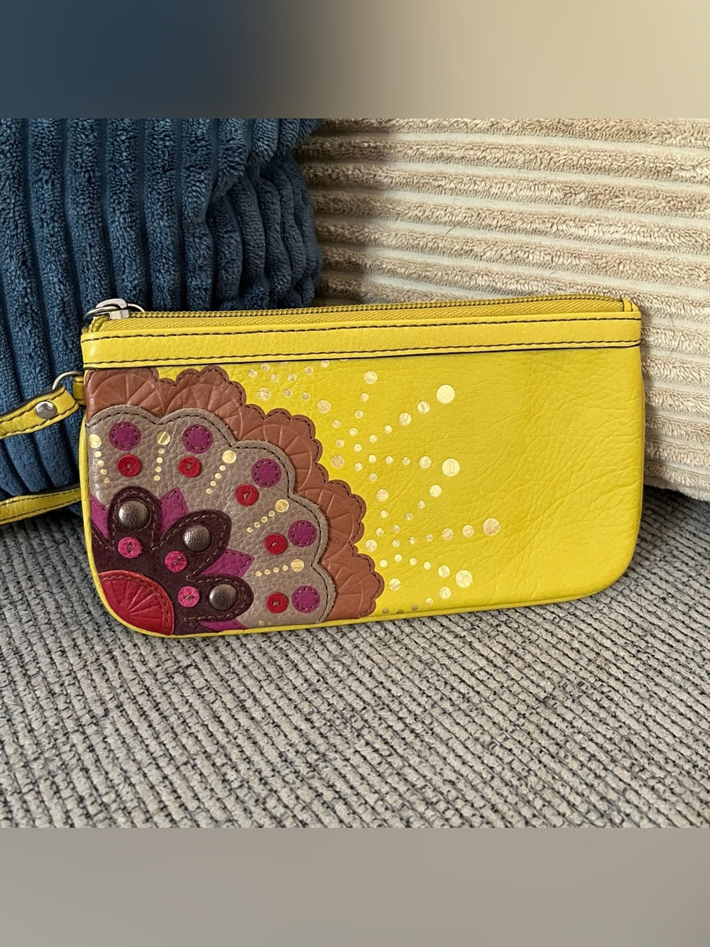 EUC Fossil mustard yellow leather wristlet leather floral appliqué detail